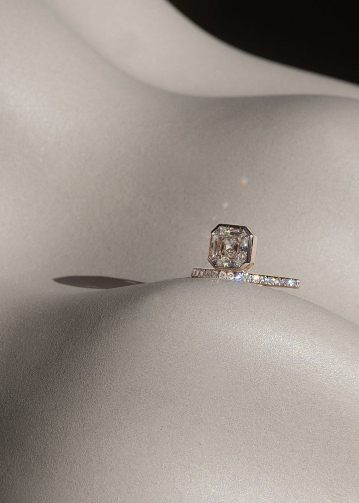 Asscher Cut Lab Grown Diamond Bezel Engagement Ring with French Pavé Band
