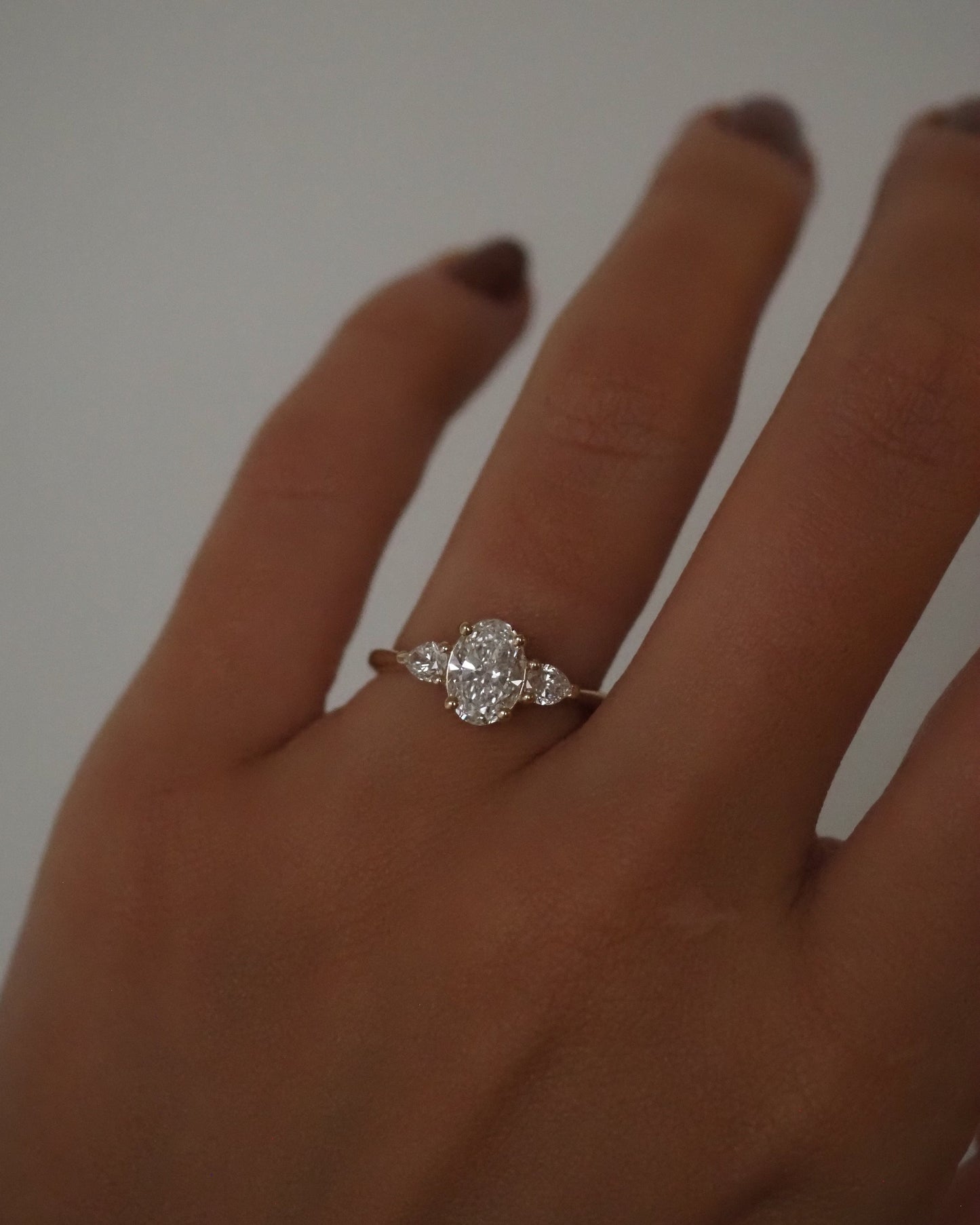 Oval Lab Diamond Three Stone Ring with Pear Accents