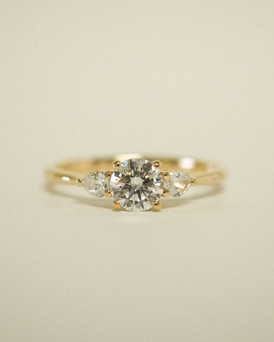 Round Lab Diamond Three Stone Ring with Pear Accents