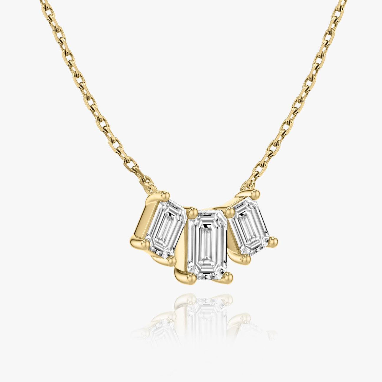 The Elara Three-Stone Emerald Lab-Grown Diamond Arc Pendant