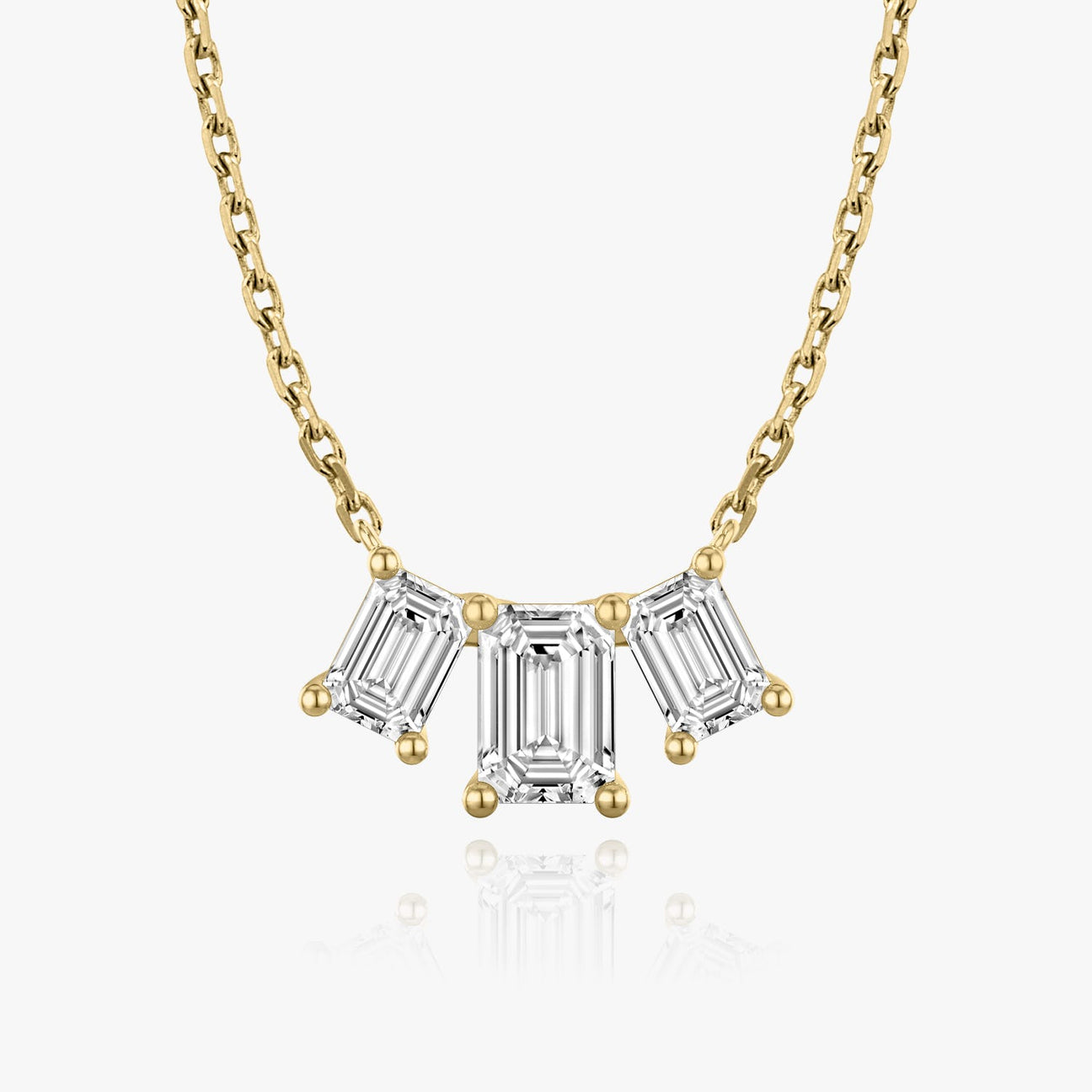 The Elara Three-Stone Emerald Lab-Grown Diamond Arc Pendant