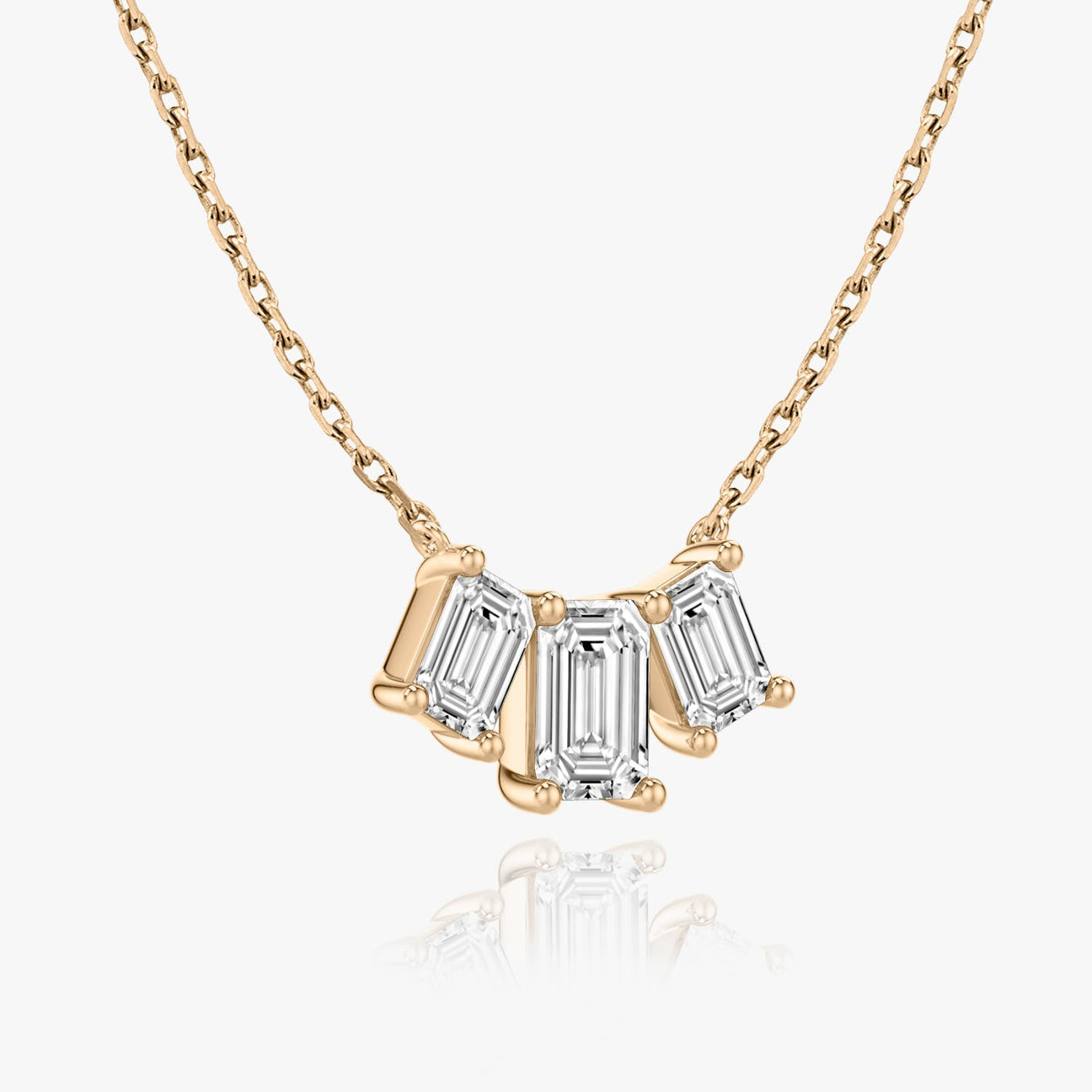 The Elara Three-Stone Emerald Lab-Grown Diamond Arc Pendant