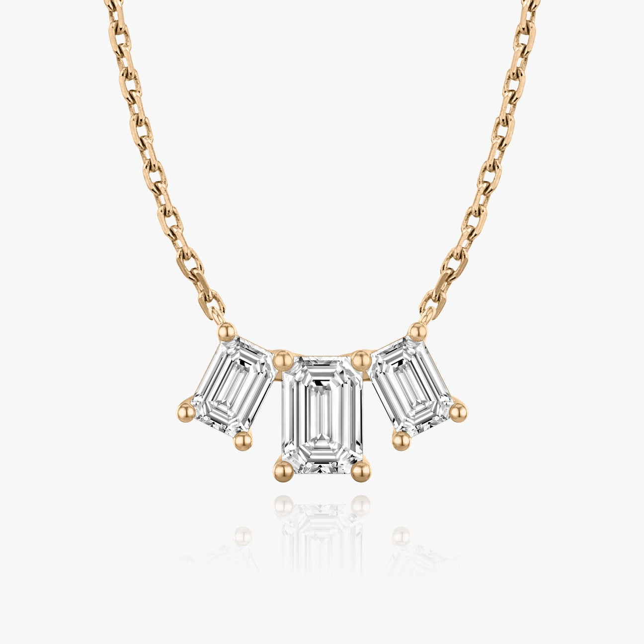 The Elara Three-Stone Emerald Lab-Grown Diamond Arc Pendant