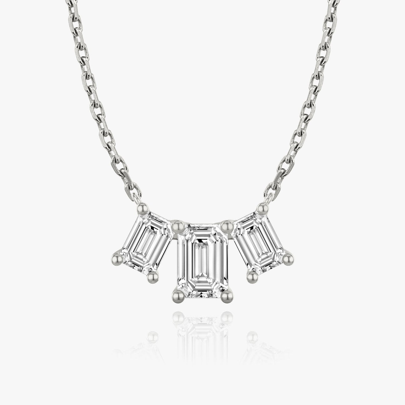 The Elara Three-Stone Emerald Lab-Grown Diamond Arc Pendant
