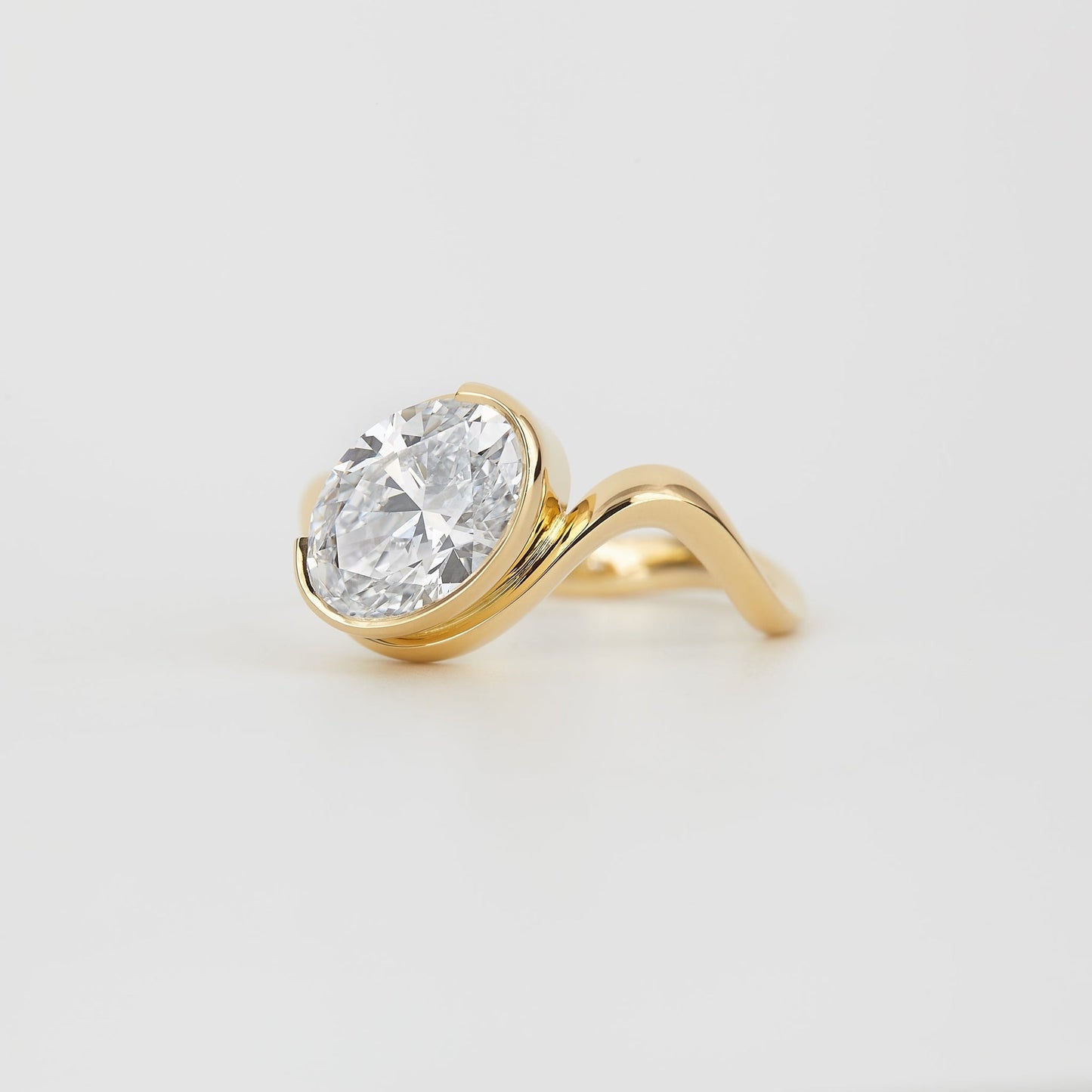 Oval Lab Grown Diamond Bezel Set Flowing Wave  Ring