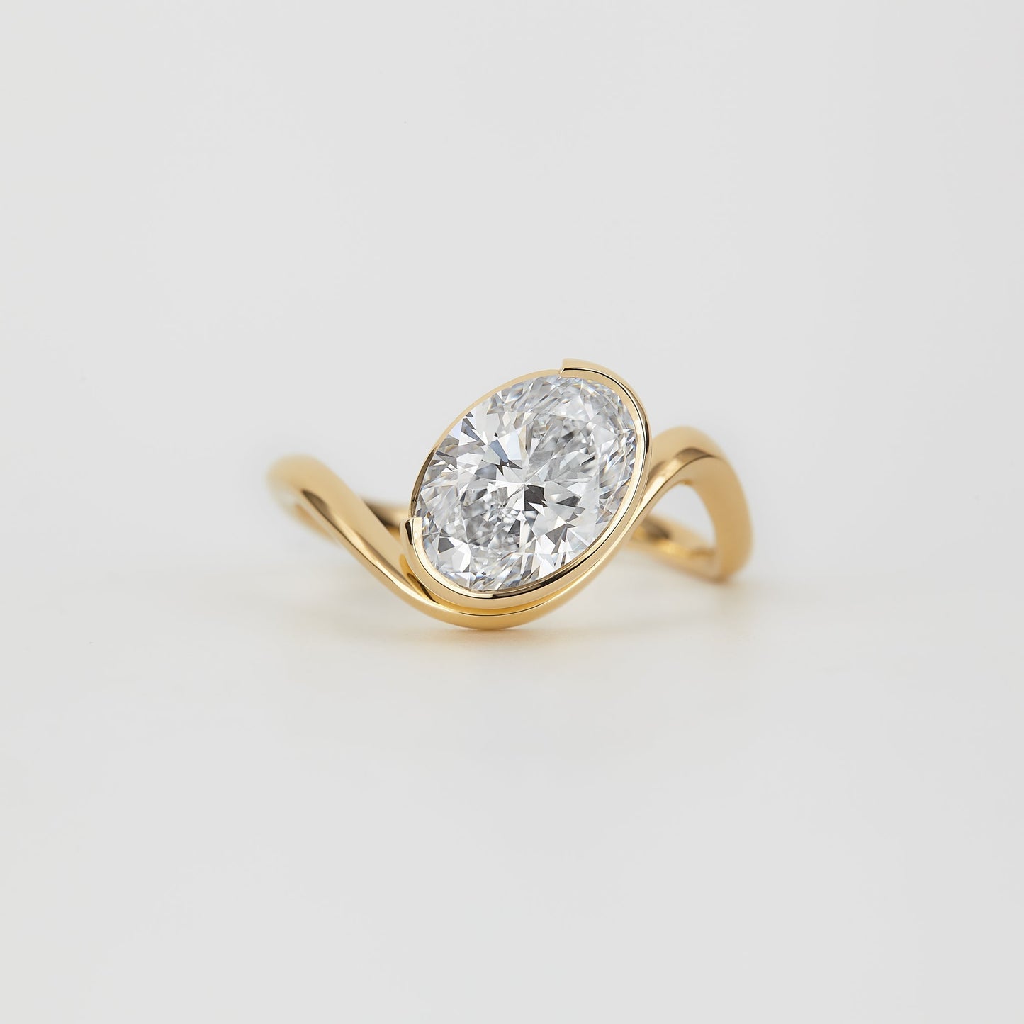 Oval Lab Grown Diamond Bezel Set Flowing Wave  Ring