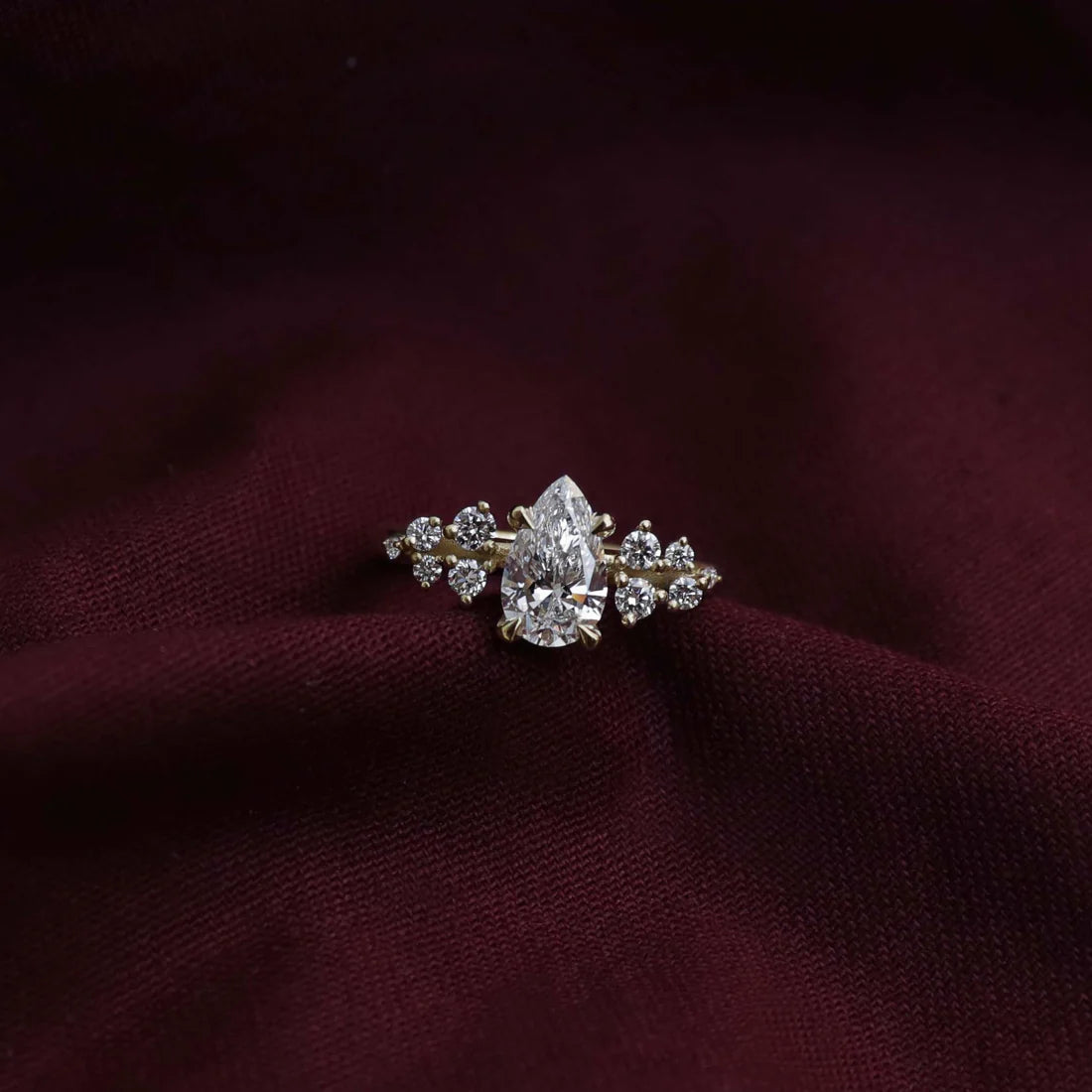 Pear Cut Lab-Grown Diamond Solitaire Engagement Ring with Cluster Diamond Shoulders