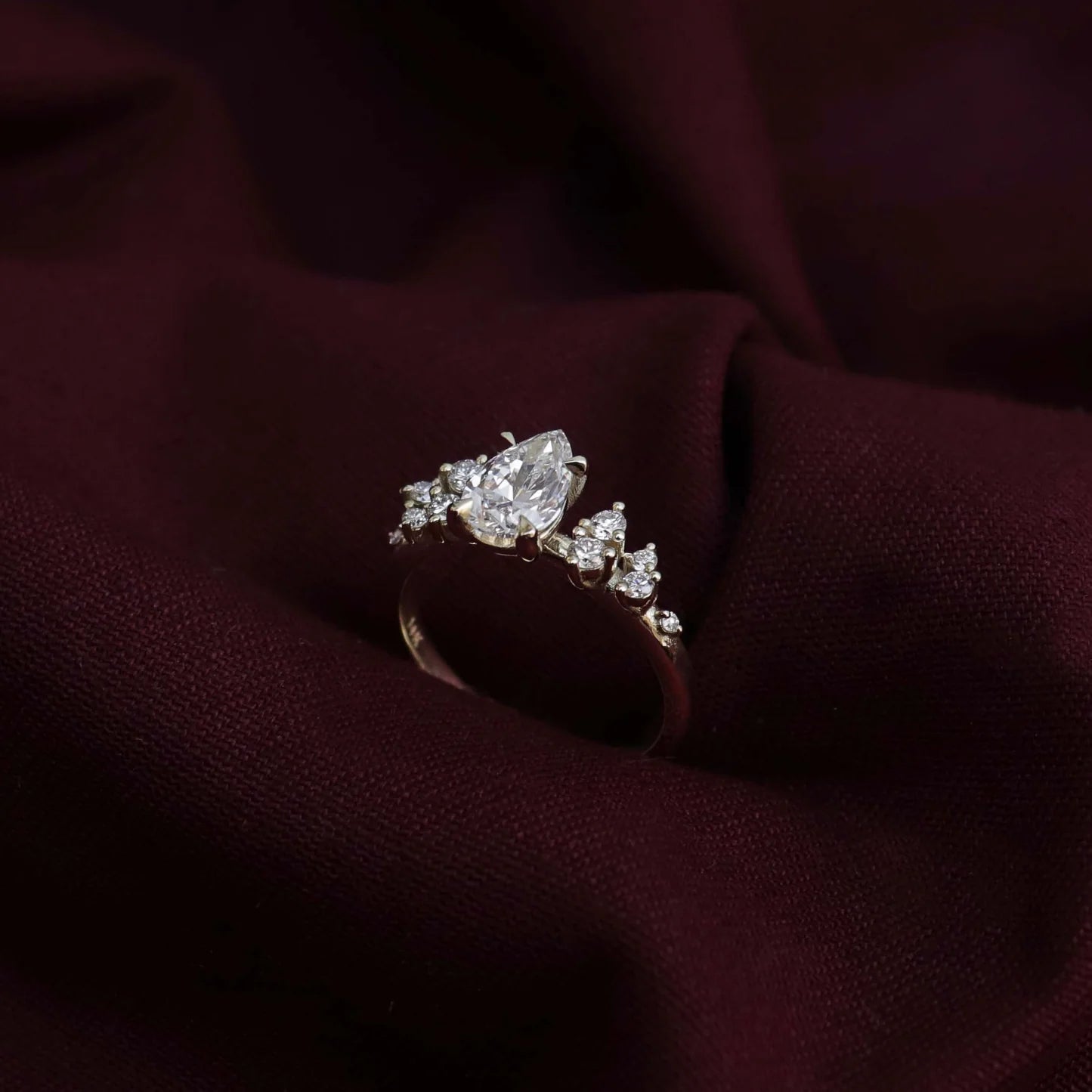 Pear Cut Lab-Grown Diamond Solitaire Engagement Ring with Cluster Diamond Shoulders