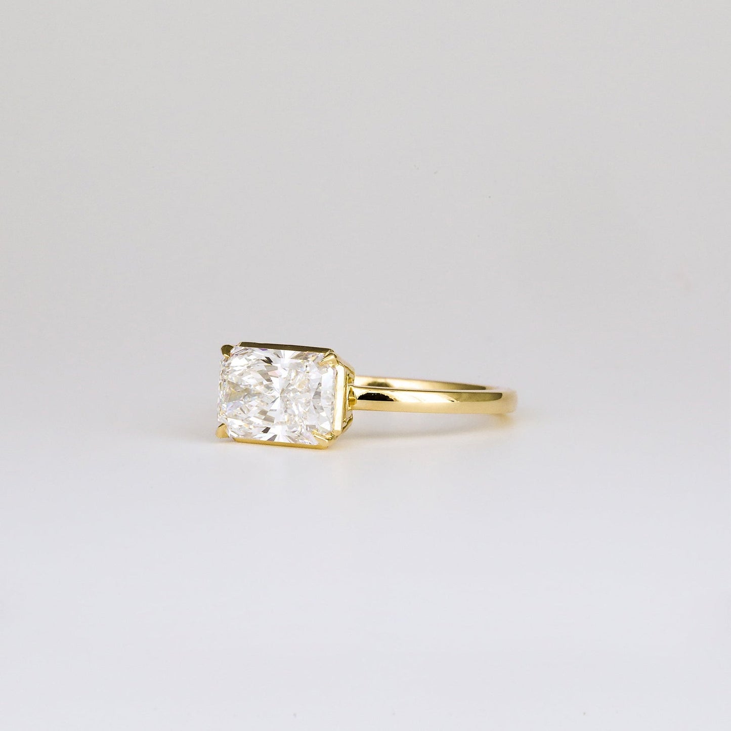 East-West Radiant Lab-Grown Diamond Bezel Engagement Ring