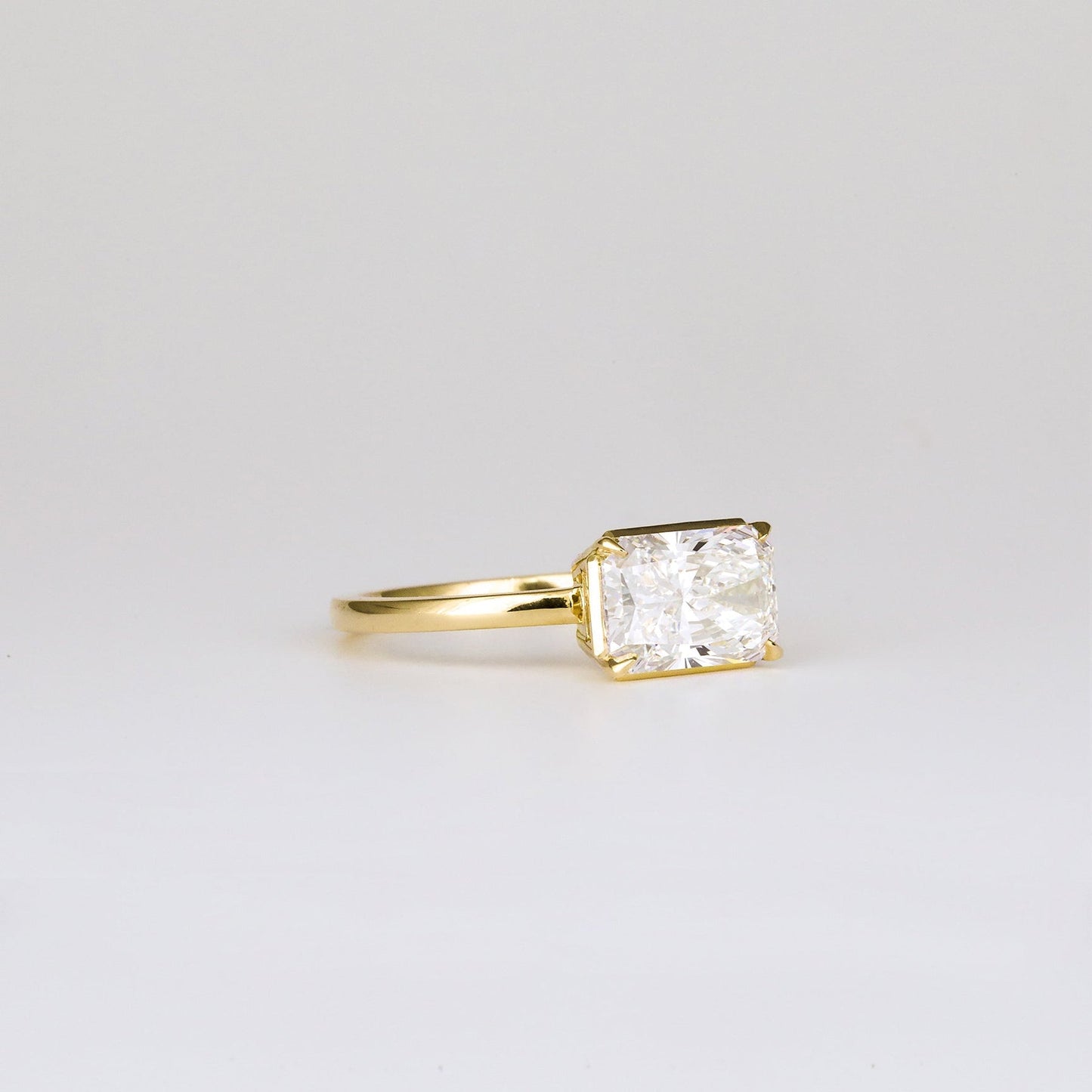 East-West Radiant Lab-Grown Diamond Bezel Engagement Ring