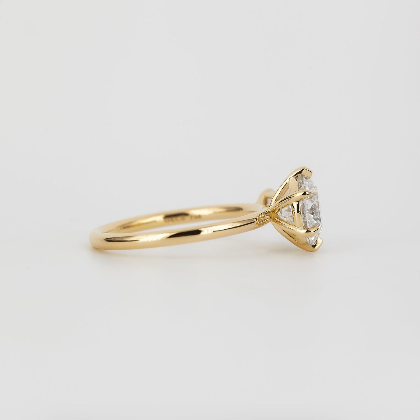 Round Lab-Grown Diamond Asymmetric Pear Accent Engagement Ring