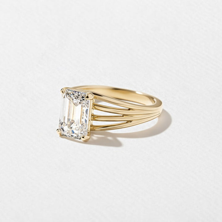 Emerald Lab Diamond Solitaire with Triple Split Band