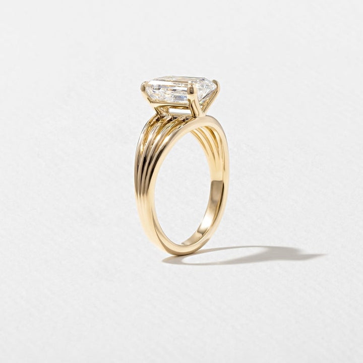 Emerald Lab Diamond Solitaire with Triple Split Band
