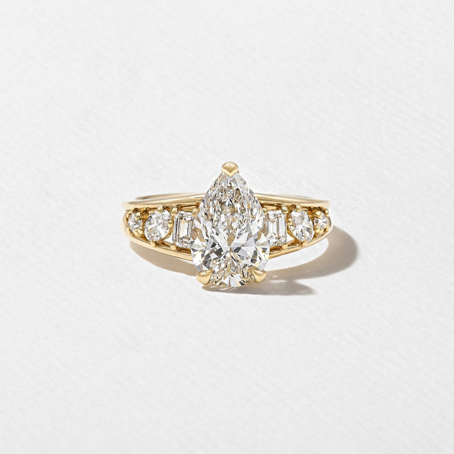 Pear Lab Diamond Ring with Round & Baguette Band