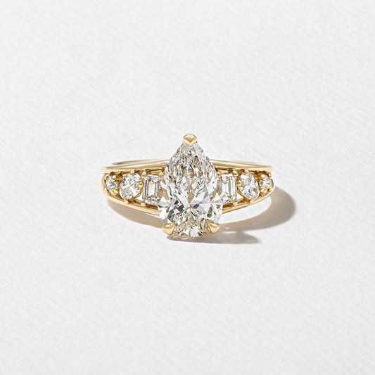 Pear Lab Diamond Ring with Round & Baguette Band