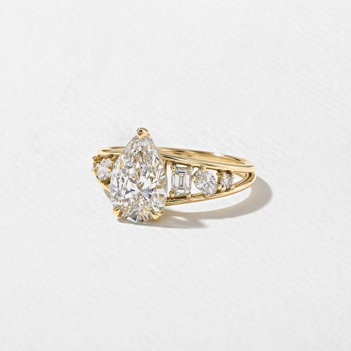 Pear Lab Diamond Ring with Round & Baguette Band