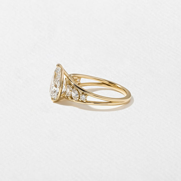 Pear Lab Diamond Ring with Round & Baguette Band