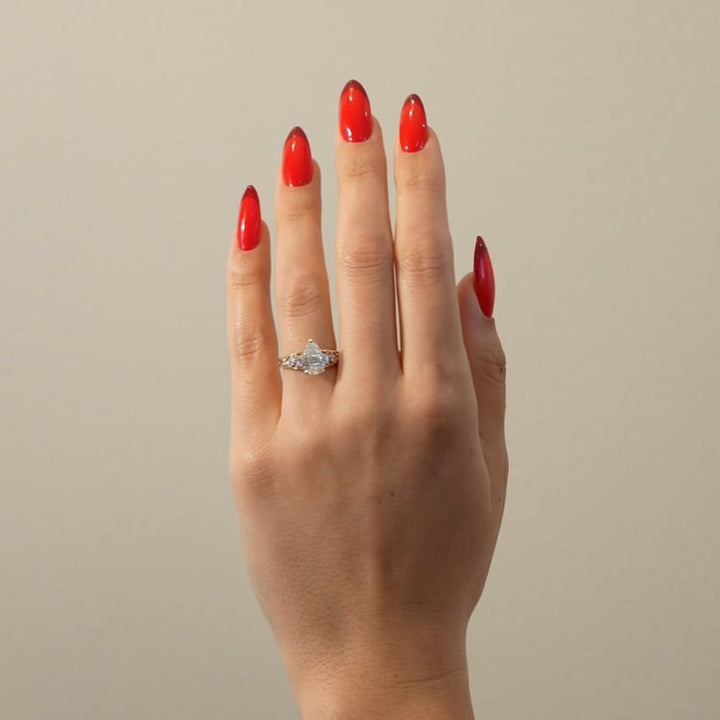 Pear Lab Diamond Ring with Round & Baguette Band
