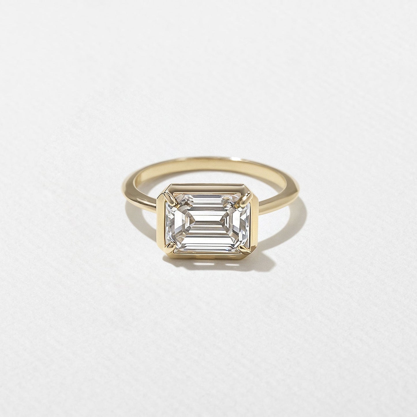 East-West Emerald Cut Lab Grown Diamond Semi-Bezel Solitaire Engagement Ring