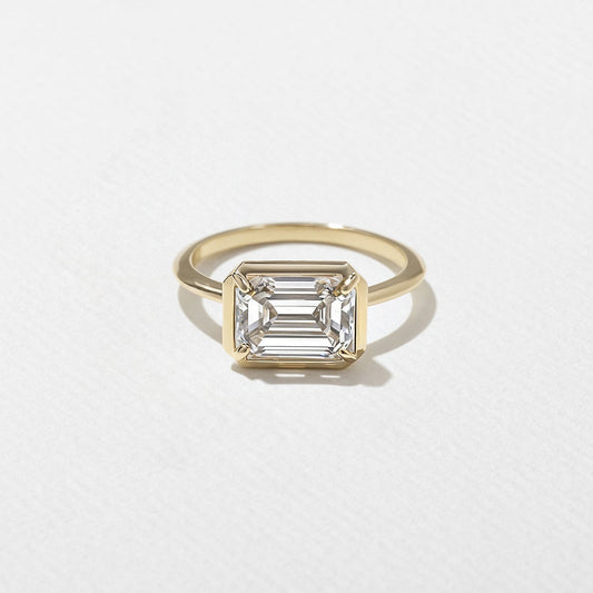 East-West Emerald Cut Lab Grown Diamond Semi-Bezel Solitaire Engagement Ring