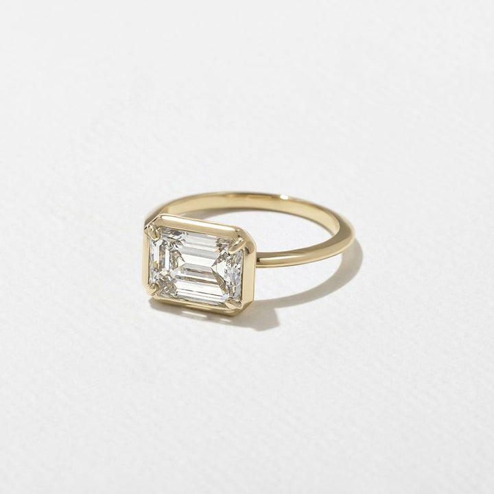 East-West Emerald Cut Lab Grown Diamond Semi-Bezel Solitaire Engagement Ring