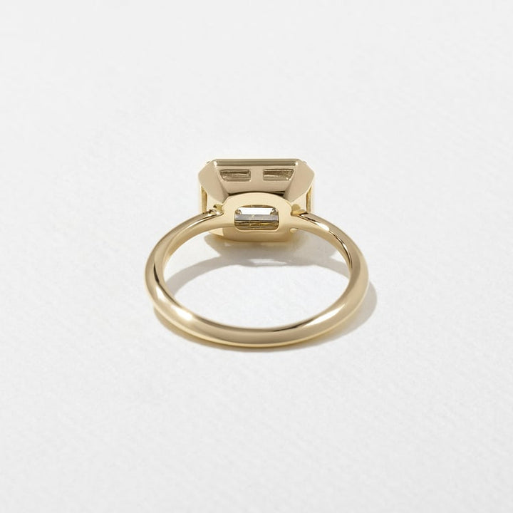 East-West Emerald Cut Lab Grown Diamond Semi-Bezel Solitaire Engagement Ring