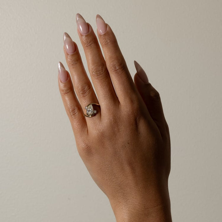 Pear Lab Grown Diamond Bypass Engagement Ring with Round Accent Stones
