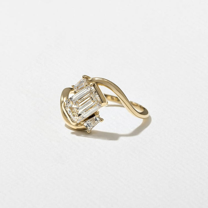 Emerald Cut Lab Grown Diamond Bypass Engagement Ring with Baguette Accent Stones