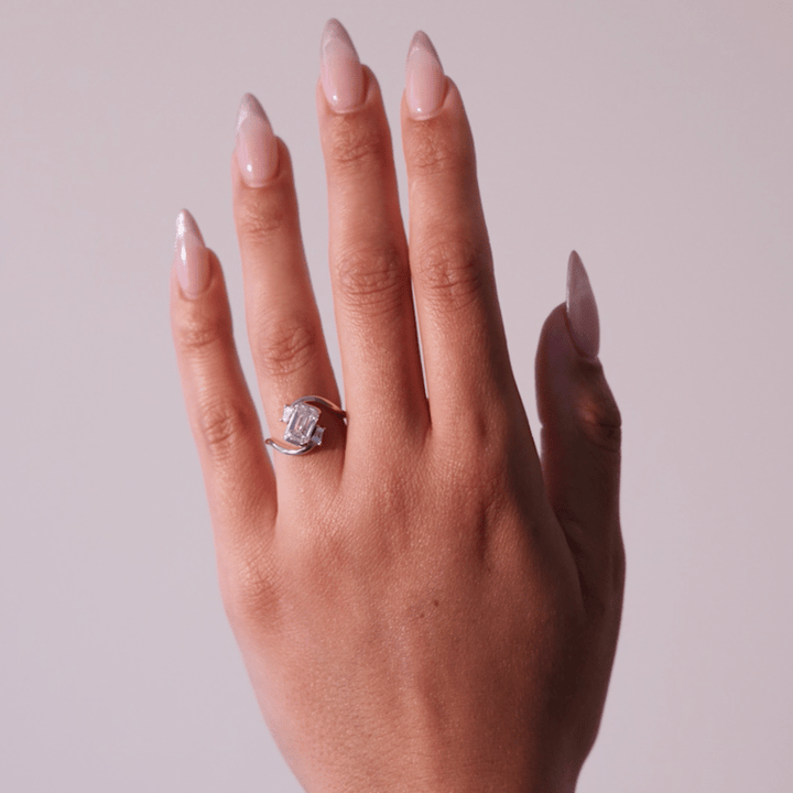Emerald Cut Lab Grown Diamond Bypass Engagement Ring with Baguette Accent Stones