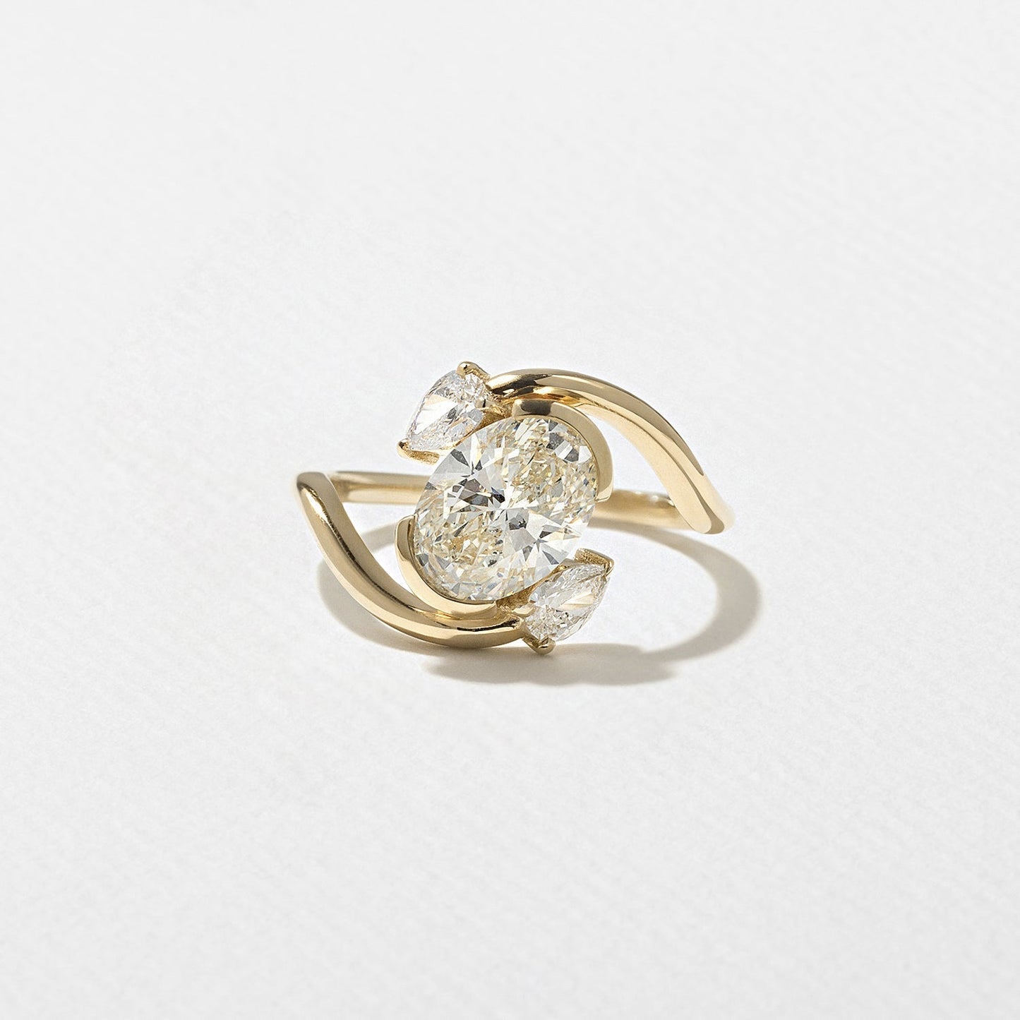 Oval Lab Grown Diamond Bypass Engagement Ring with Pear Accent Stones