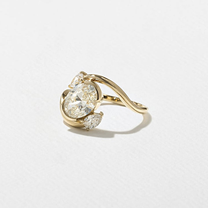 Oval Lab Grown Diamond Bypass Engagement Ring with Pear Accent Stones