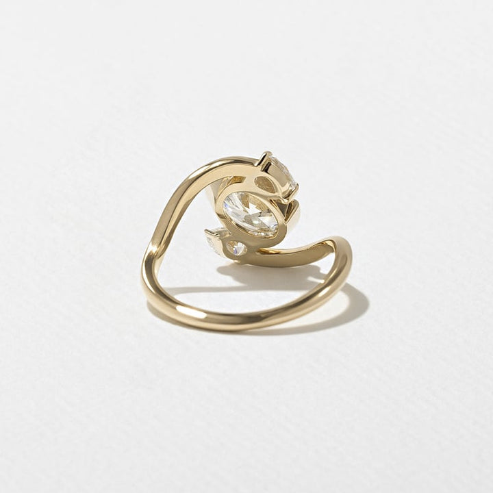 Oval Lab Grown Diamond Bypass Engagement Ring with Pear Accent Stones
