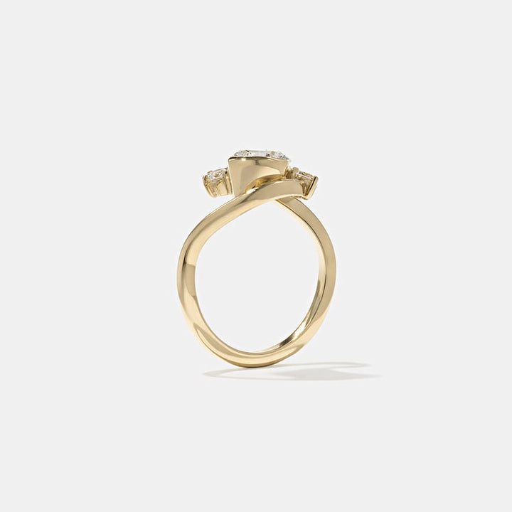 Oval Lab Grown Diamond Bypass Engagement Ring with Pear Accent Stones