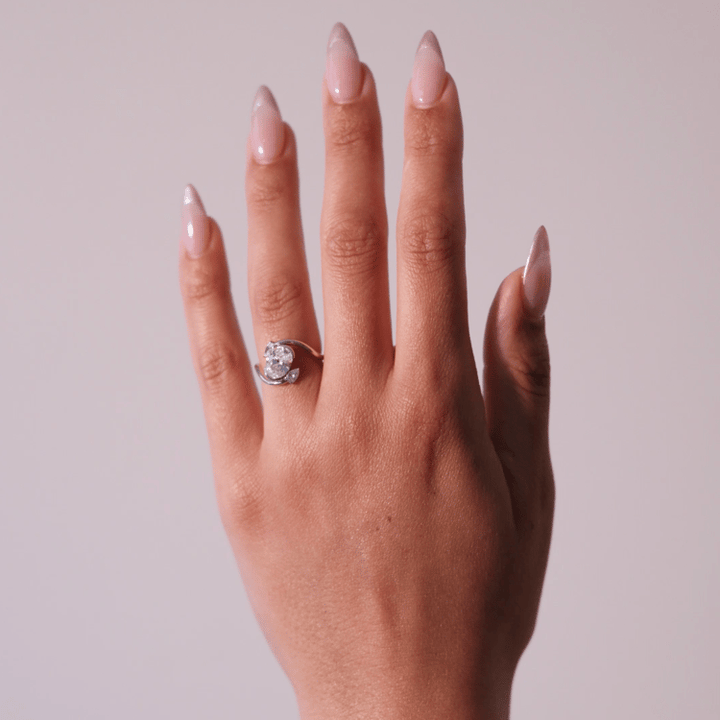 Oval Lab Grown Diamond Bypass Engagement Ring with Pear Accent Stones