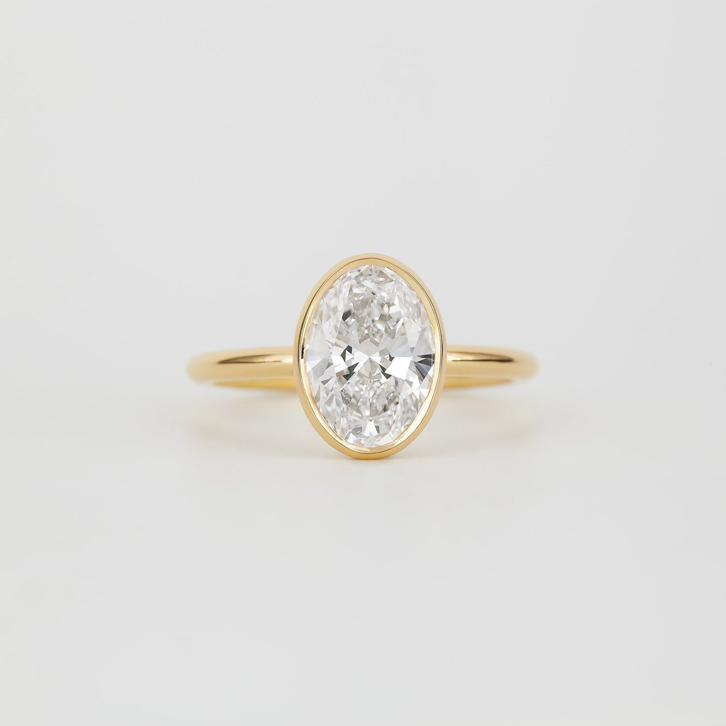 Oval Lab-Grown Diamond Bezel Hidden Halo Engagement Ring