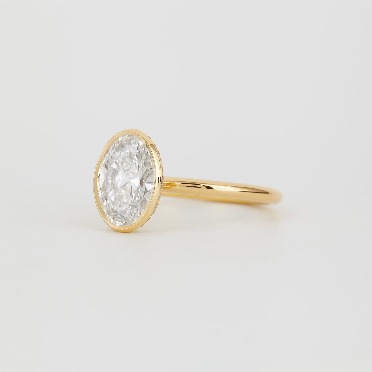 Oval Lab-Grown Diamond Bezel Hidden Halo Engagement Ring