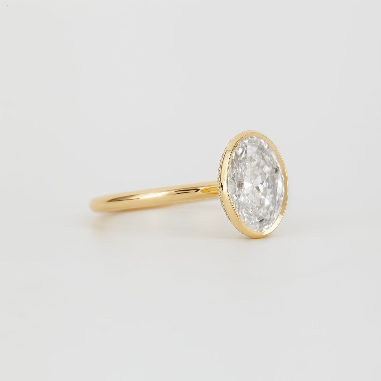 Oval Lab-Grown Diamond Bezel Hidden Halo Engagement Ring