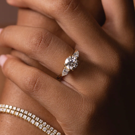Round Cut Lab-Grown Diamond Three Stone Engagement Ring with Pear Accents