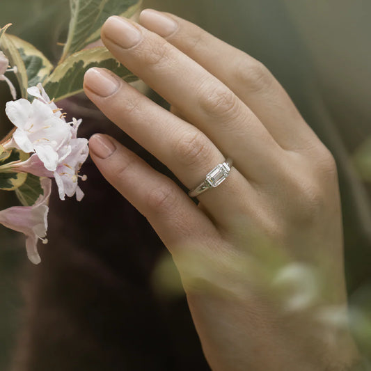 East-West Emerald Cut Lab-Grown Diamond Bar-Set Engagement Ring with Dome Band