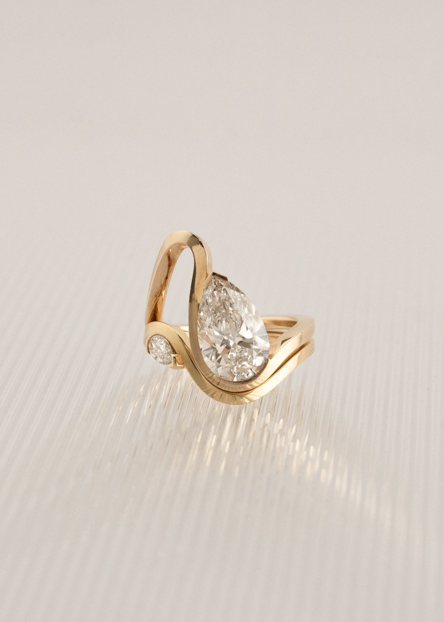 Pear Lab Grown Diamond Open Loop Bezel Engagement Ring – Sculptural Wrap Band
