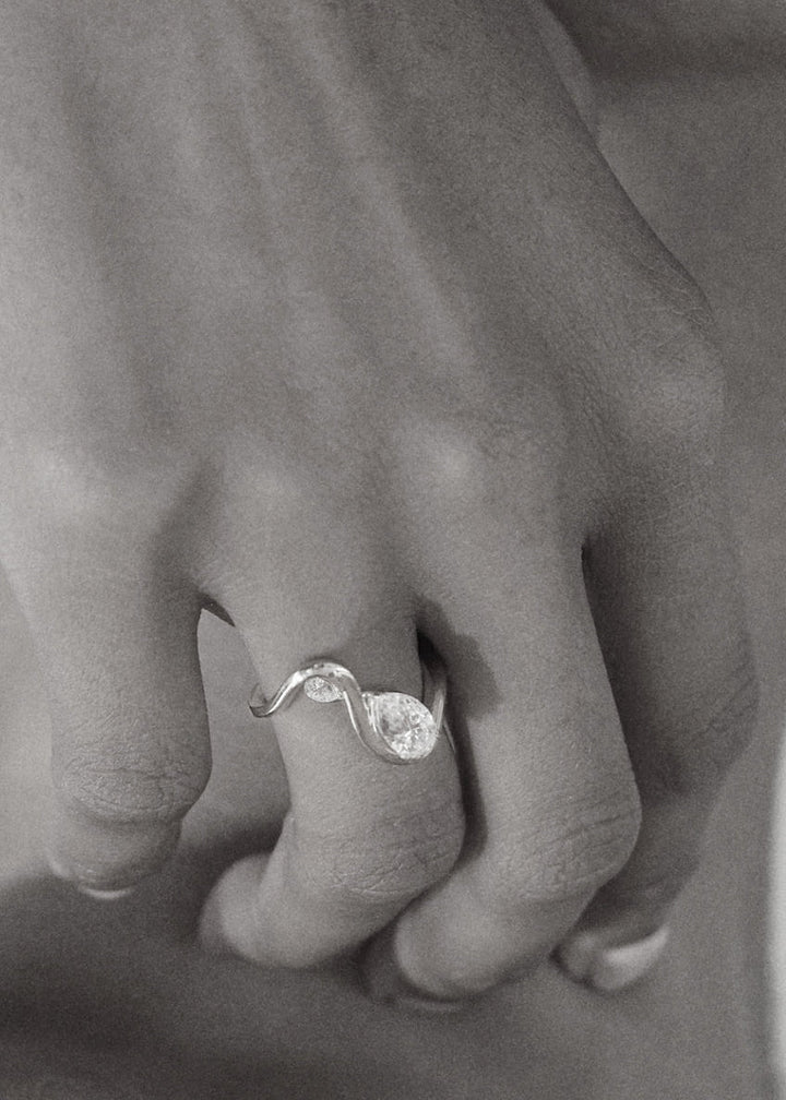 Pear Lab Grown Diamond Infinity Loop Bezel Ring with Pear Accent Stone