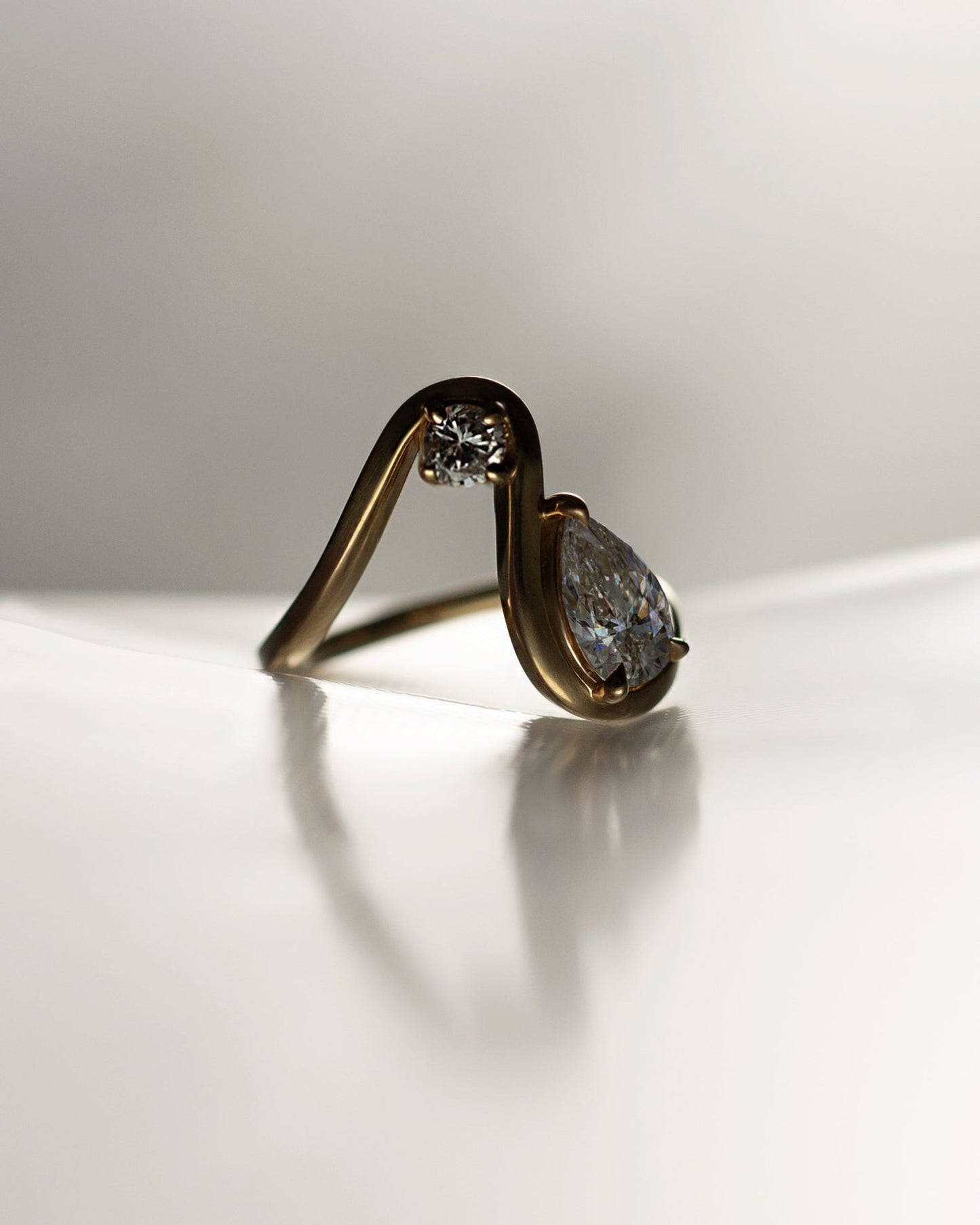 Pear Lab Grown Diamond Open Loop Bezel Ring with Round Accent – Sculptural Arch Band