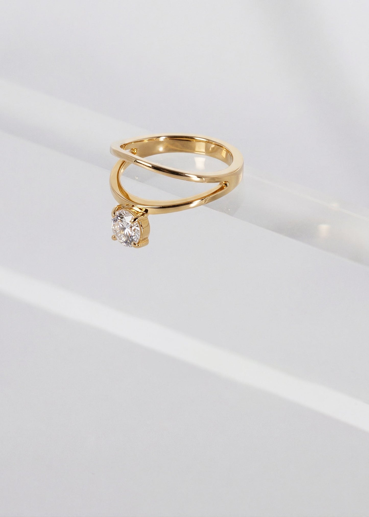 Round Lab Grown Diamond Criss-Cross Solitaire Engagement Ring – X Band Setting