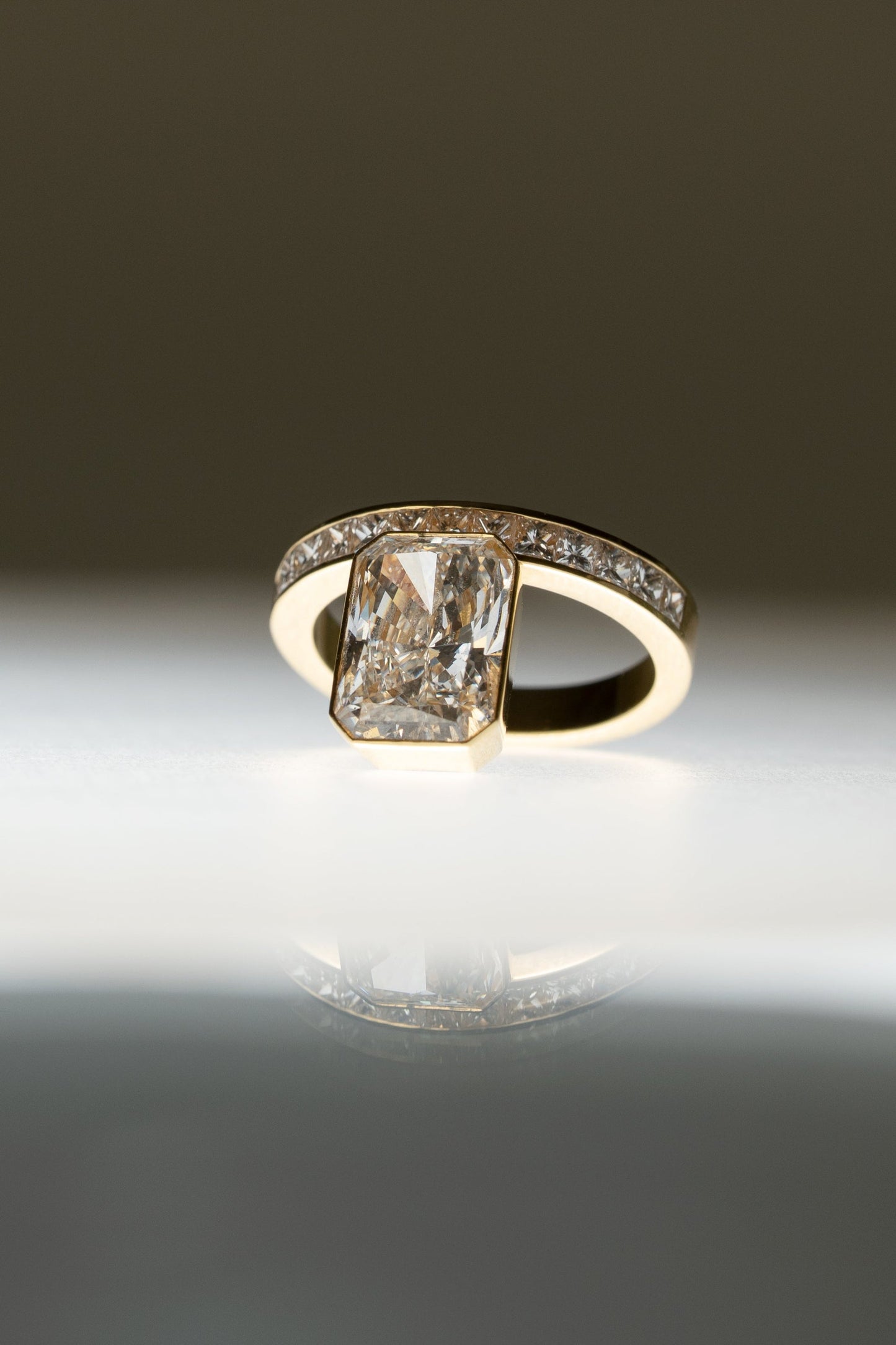 Radiant Cut Lab Grown Diamond Bezel Engagement Ring with Princess Channel Band
