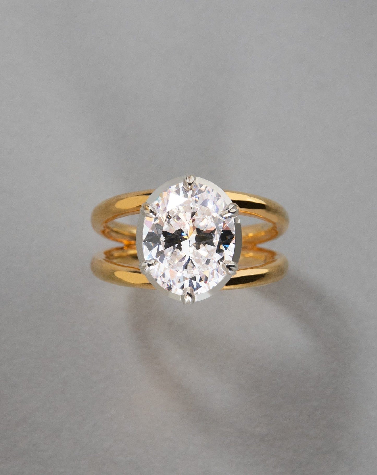 Oval Lab Diamond Solitaire on Double Gold Band