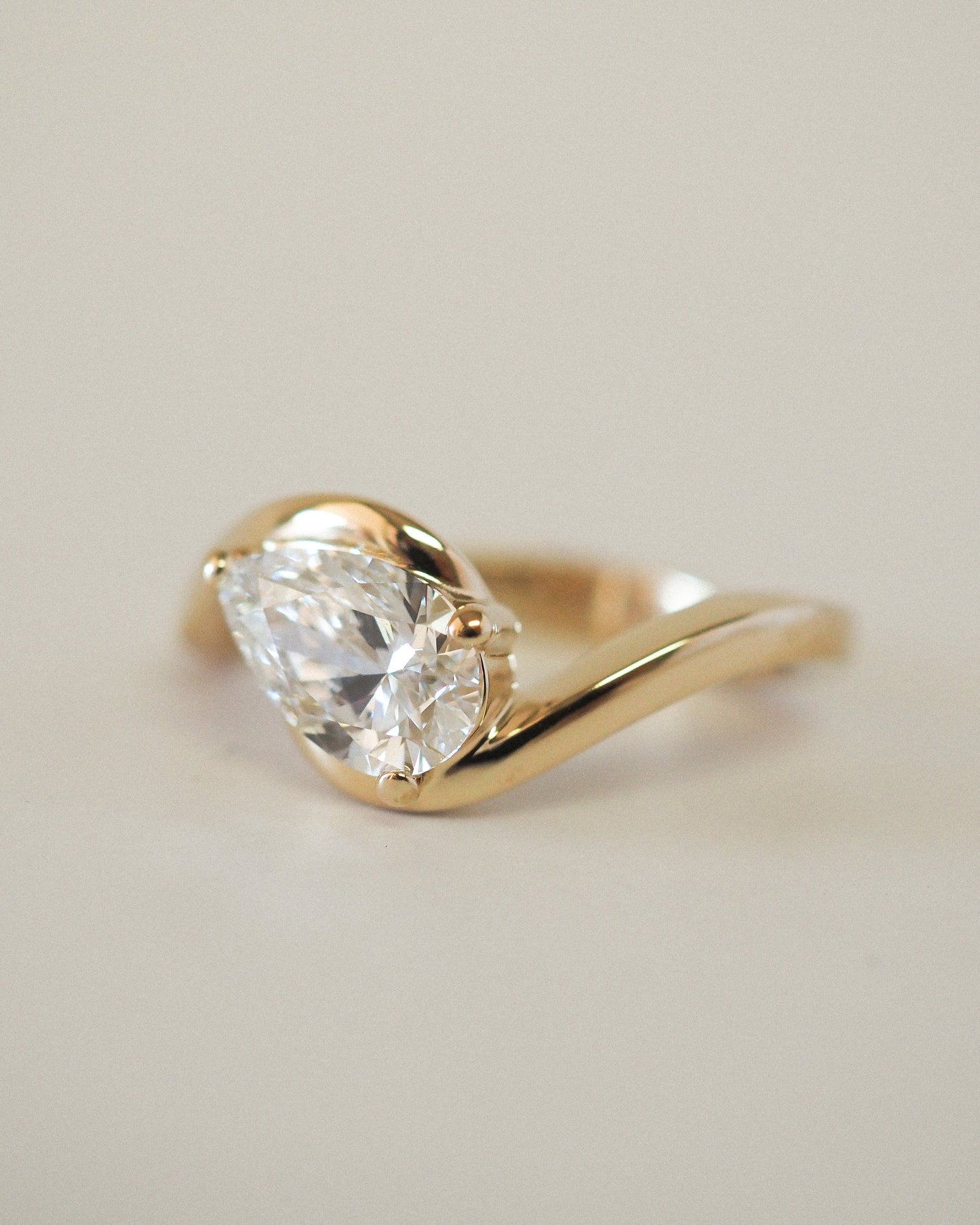East-West Pear Lab Grown Diamond Half-Bezel Bypass Solitaire Engagement Ring