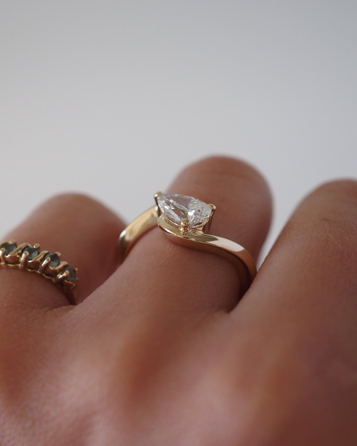 East-West Pear Lab Grown Diamond Half-Bezel Bypass Solitaire Engagement Ring