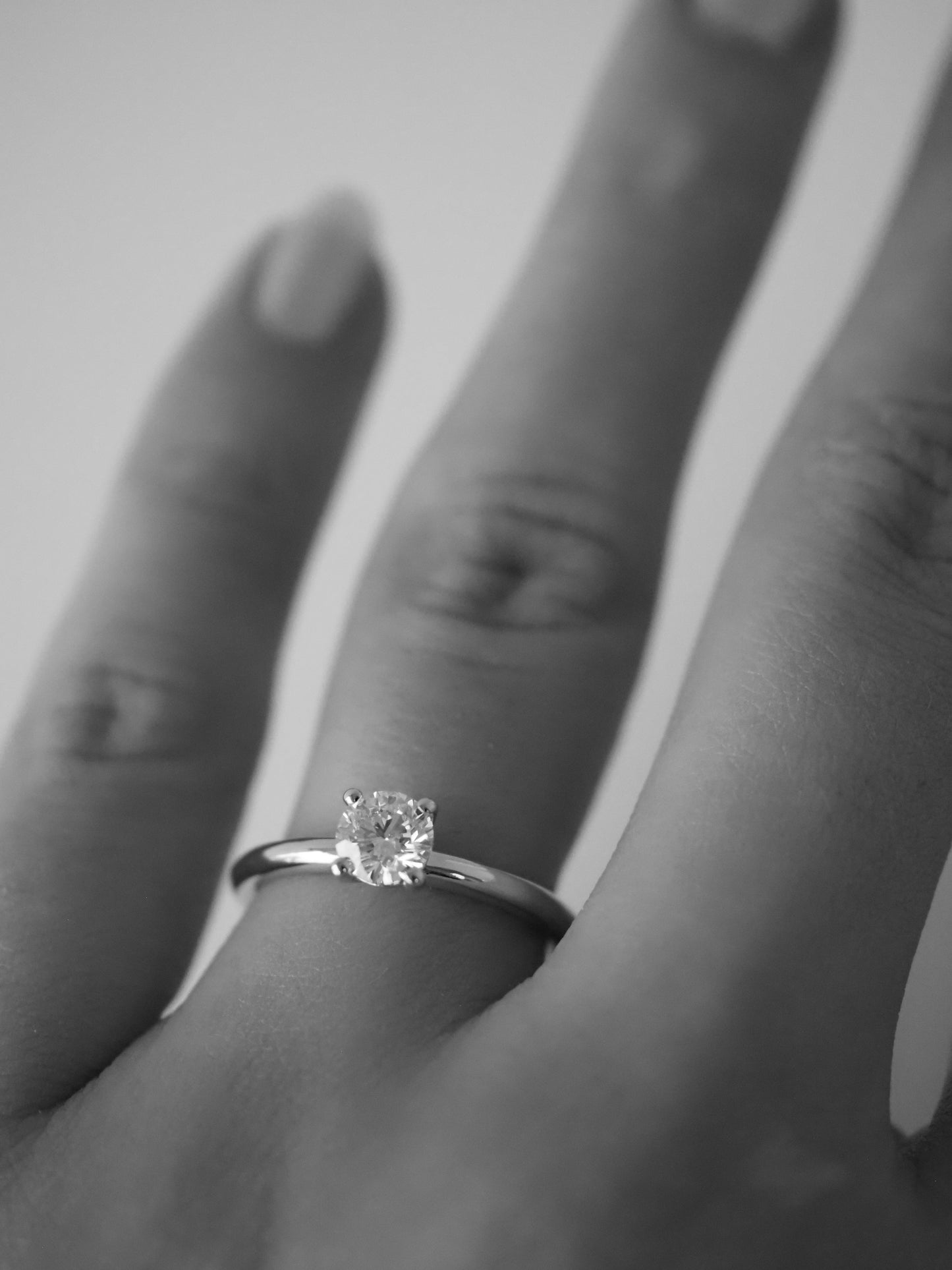 Title: Round Lab Diamond Solitaire Ring with Plain Band