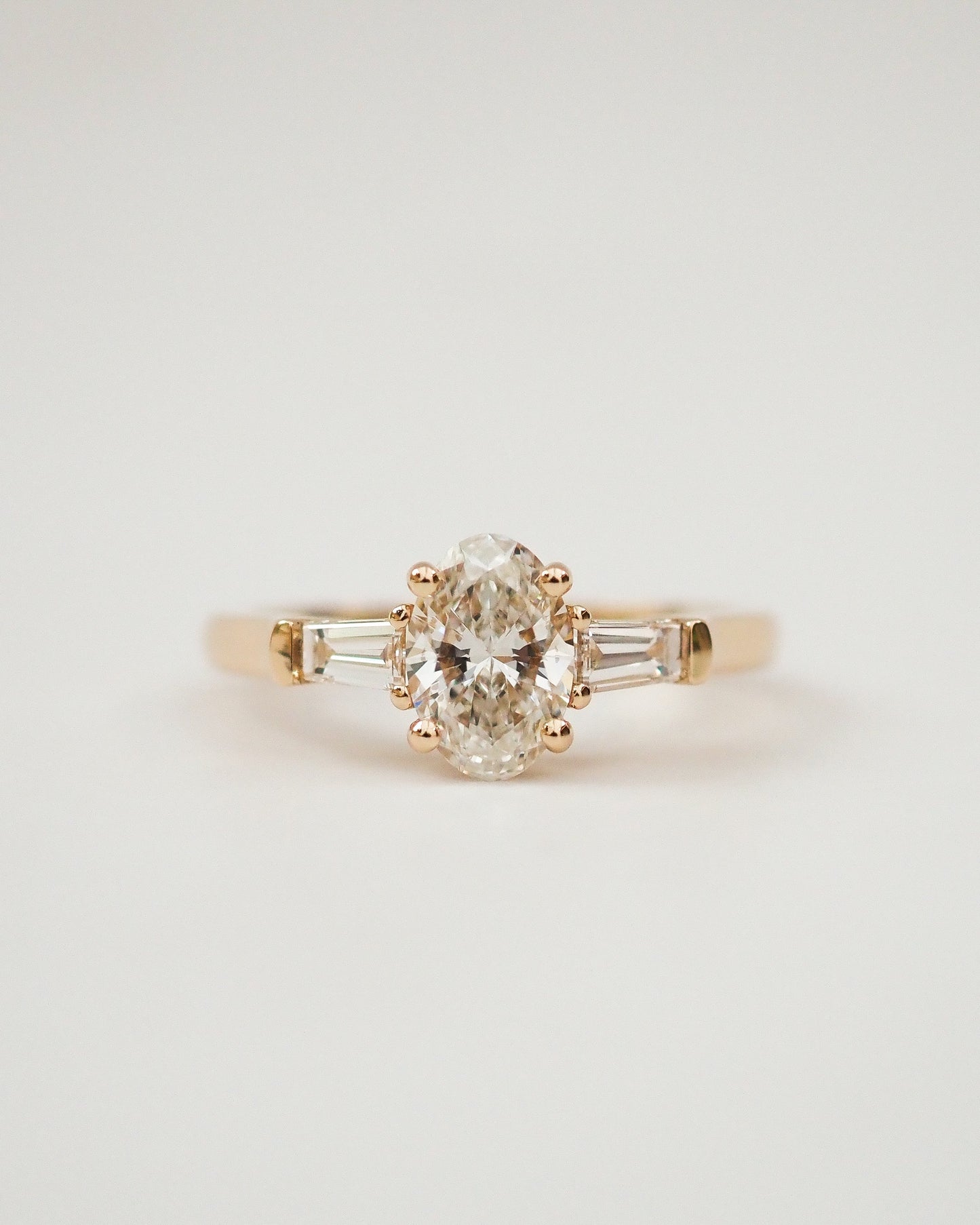 Oval Lab Diamond Three Stone Ring with Baguette Accents