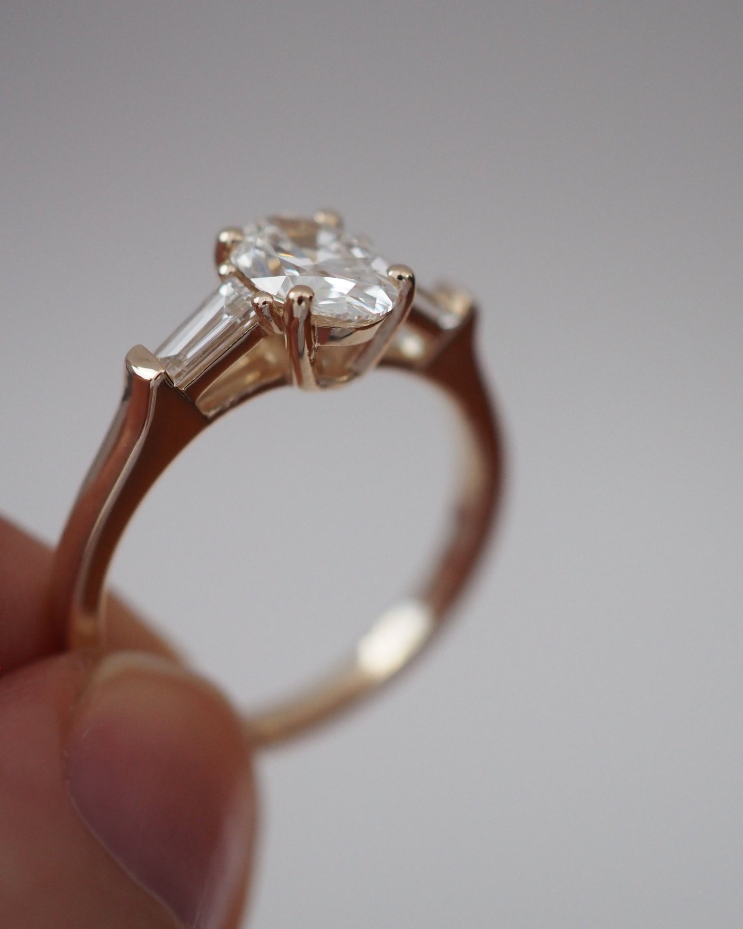 Oval Lab Diamond Three Stone Ring with Baguette Accents